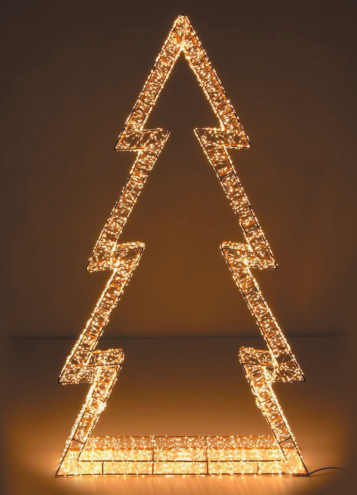Albero Luminoso 3D con Led Bianco Caldo e Led Flash disponibile in 2 diverse dimensioni, pensato per poter essere appeso, ma spesso utilizzato anche d'appoggio - Idea regalo