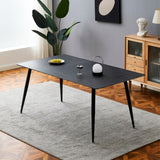 Tavolo 140x80 con top in ceramica effetto marmo grigio opaco e gambe in metallo nero.